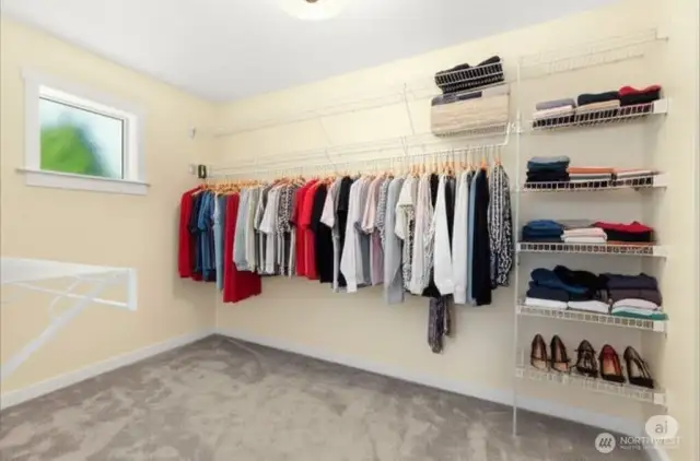 Primary walk-in closet with built-ins.