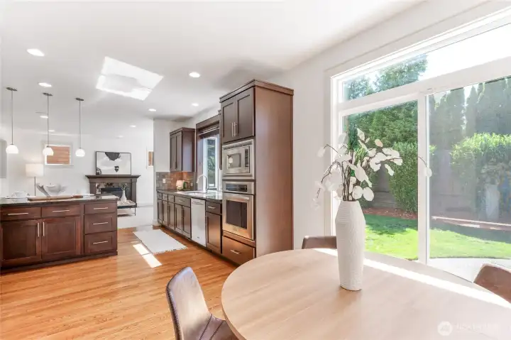 Dining nook with backyard views