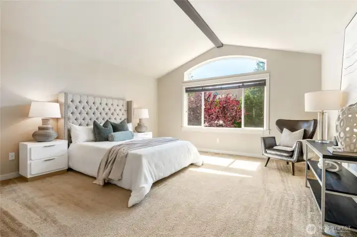 Sitting space and backyard views from the primary suite