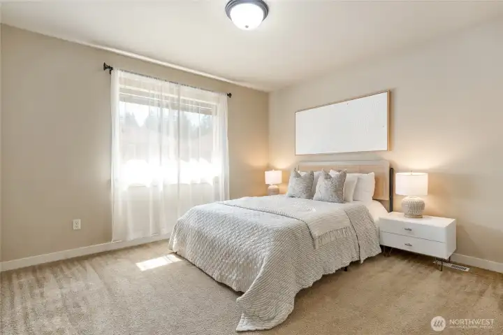 Another sunlit bedroom
