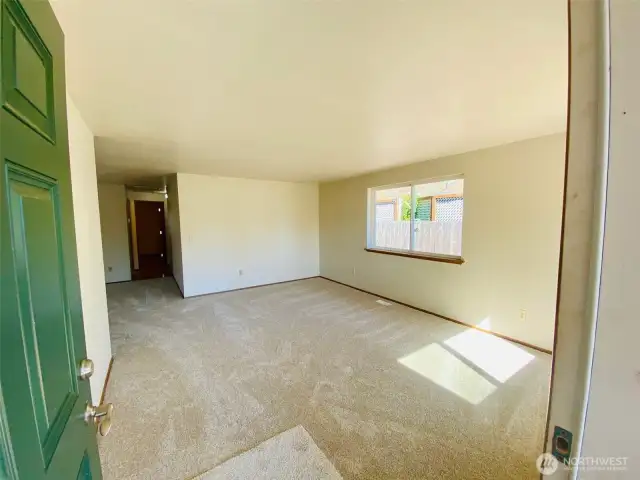 From front entry, you will be greeted with a welcoming open concept floor plan with all new flooring and fresh paint.