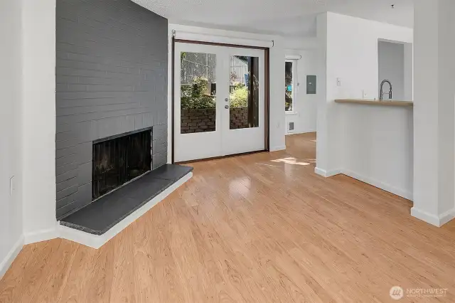 Kitchen features breakfast bar pass-through.