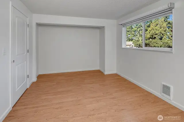 Extra wide closet is ready for efficient closet organizer customization.