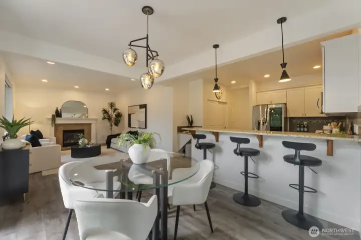 A stunning view of the great room from the dining area