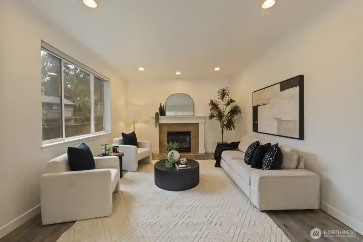 Beautiful living room with gas fireplace. There's a smurf tube in the