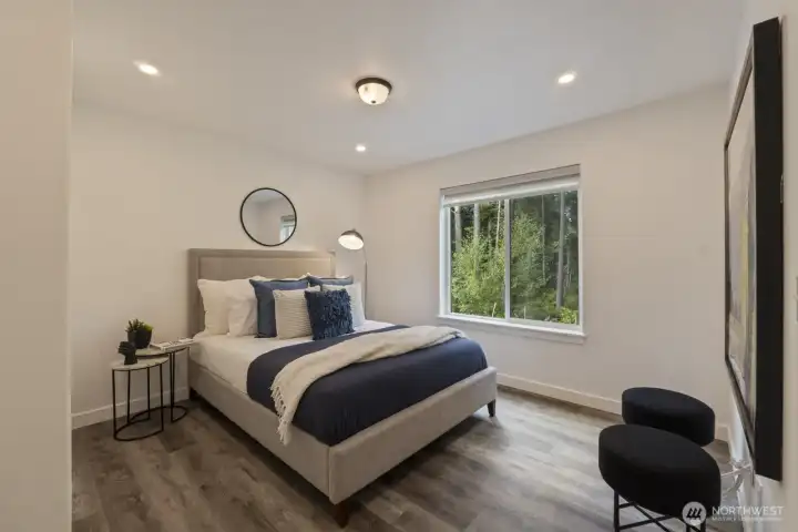 Large secondary bedroom upstairs faces the front of the property