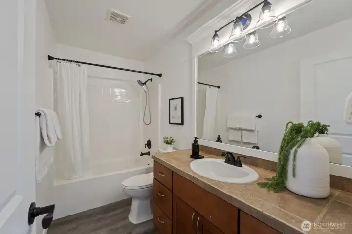 Upstairs hall bath in excellent condition.