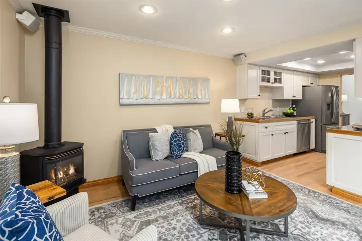 Open to the kitchen, the family room features a newer gas stove for cozy winter nights—along with central AC for year-round comfort.