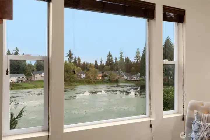 Wake up to soft morning light and tranquil water views with this peaceful east-facing exposure. From the primary suite, the ever-changing lake scenery provides a calming connection to nature — a serene backdrop for quiet mornings and a restful way to begin each day.