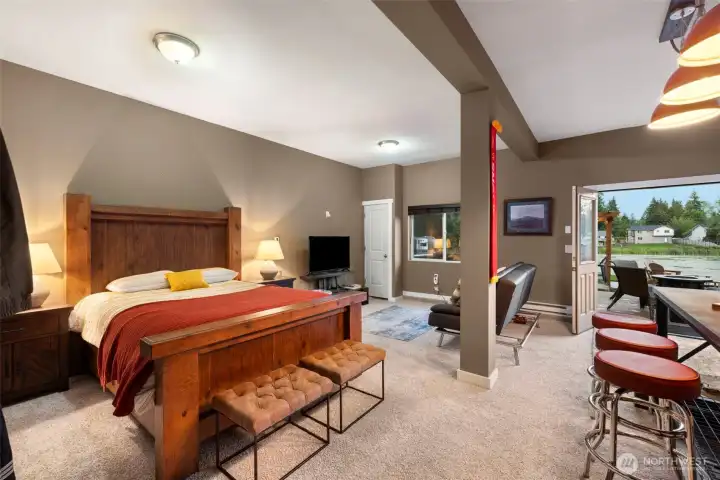 A spacious daylight-level retreat offering incredible flexibility — ideal as a guest suite, bonus room, or future studio apartment. There’s ample room for sleeping, lounging, and entertaining, with direct access to the backyard and lake beyond.