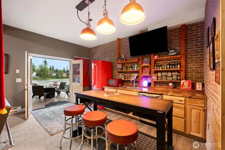 A well-appointed kitchenette makes this space feel complete — with custom cabinetry, stylish lighting, and plenty of prep and storage space. It’s perfect for guests, extended stays, or creating a private apartment-style setup.