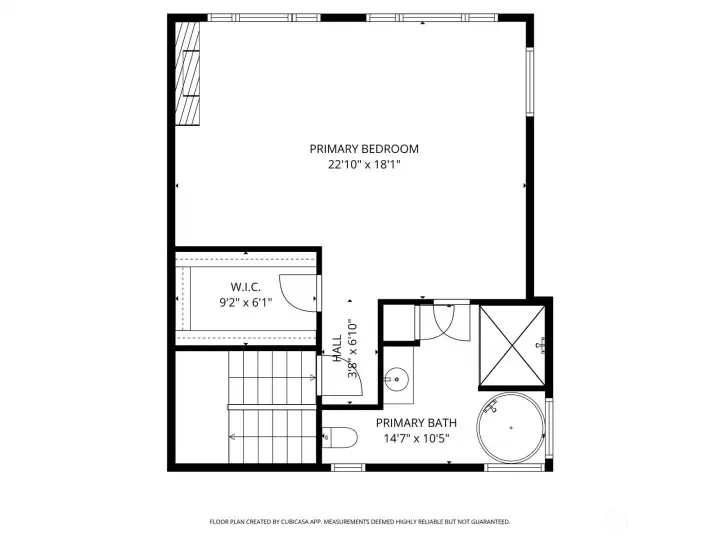 The entire upper level is dedicated to an expansive primary suite — a true retreat offering space, privacy, and beautiful lake views. The generously sized bedroom easily accommodates a king-size bed with room to spare for a full seating area by the propane fireplace. Large east-facing windows fill the room with natural morning light and frame the serene water views. A feature wall of rich wood adds warmth and character, creating a cozy yet refined atmosphere. The ensuite bathroom includes a separate soaking tub and shower, a large vanity with storage, and a dedicated linen closet. Just beyond, a spacious walk-in closet provides excellent storage and organization. Thoughtfully designed for comfort and relaxation, this suite is the ideal place to unwind at the end of the day.