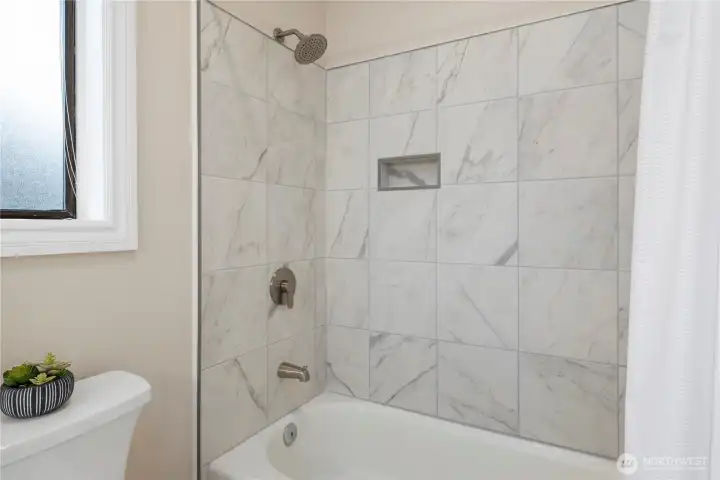 Upper primary suite bathroom