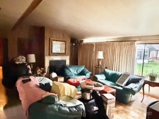 living room with vaulted ceilings