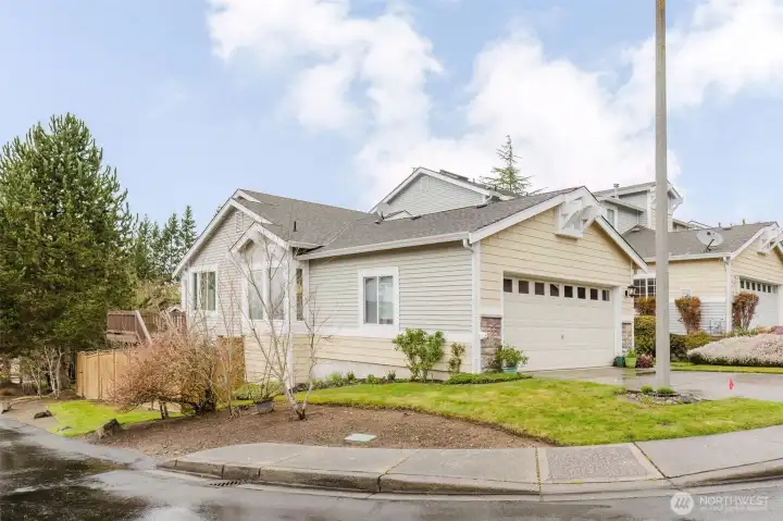 Welcome home to your bright and cheerful corner lot!