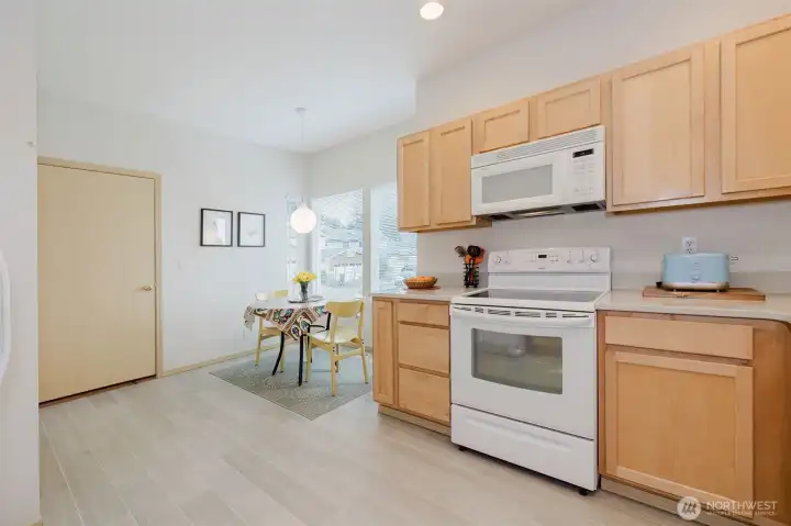 Bright and roomy kitchen with breakfast nook.