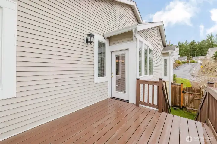Deck has stairs to the backyard.