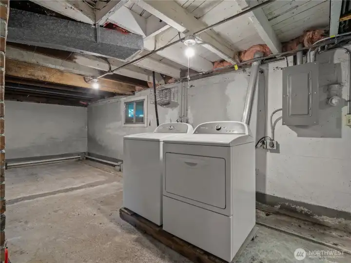 Unfinished basement includes laundry area and offers flexible space with potential for future finishing or additional storage.