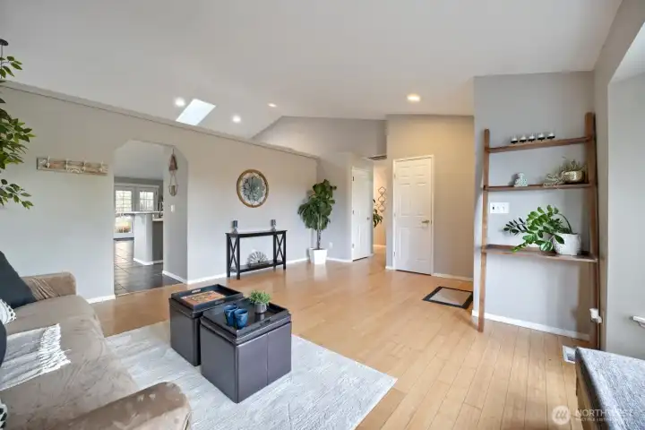 Coat closet at entry & adjacent linen closet across from laundry room. Half or "pony" wall allows for airflow and natural light