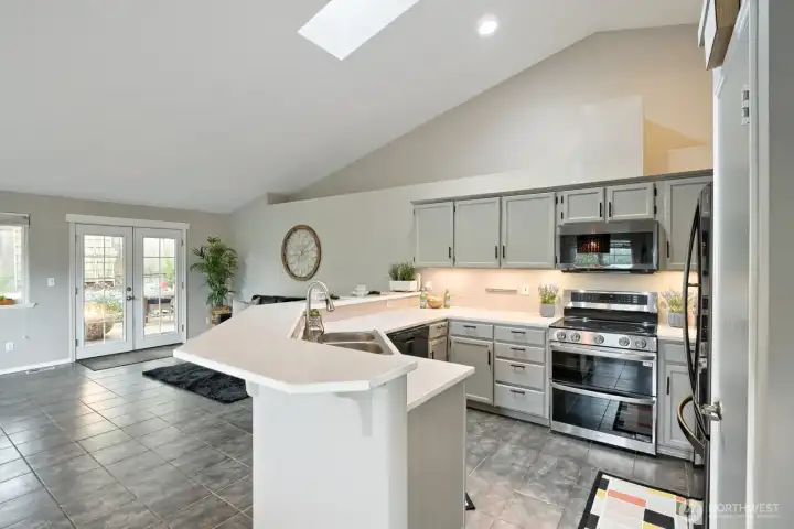 Look at all this counter space!  Pantry pictured on the right in this photo- large with many shelves