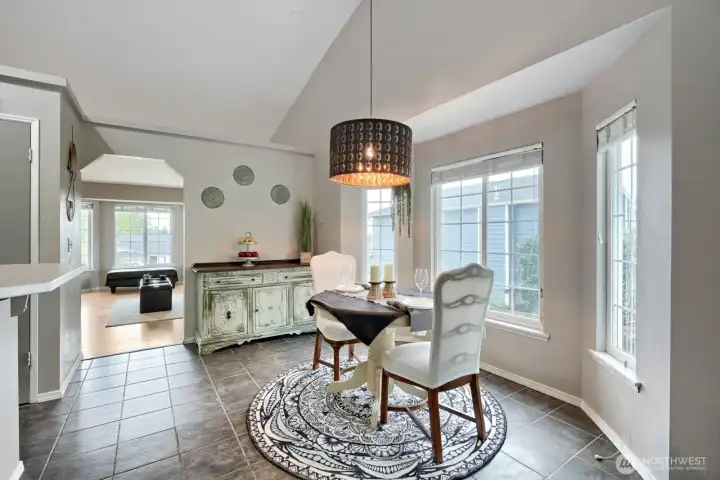 Formal dining with bayed window & stylish chandelier