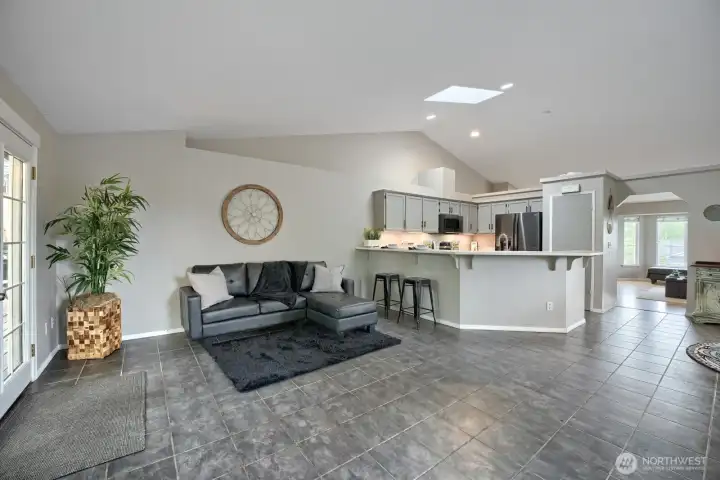 Skylight above Kitchen and family room. Recessed lighting throughout