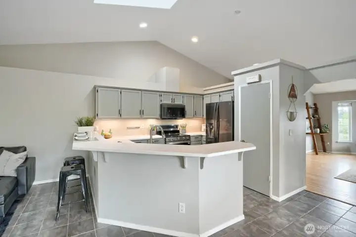 Informal breakfast bar- excellent space saver for quick meals, self service & social interactions