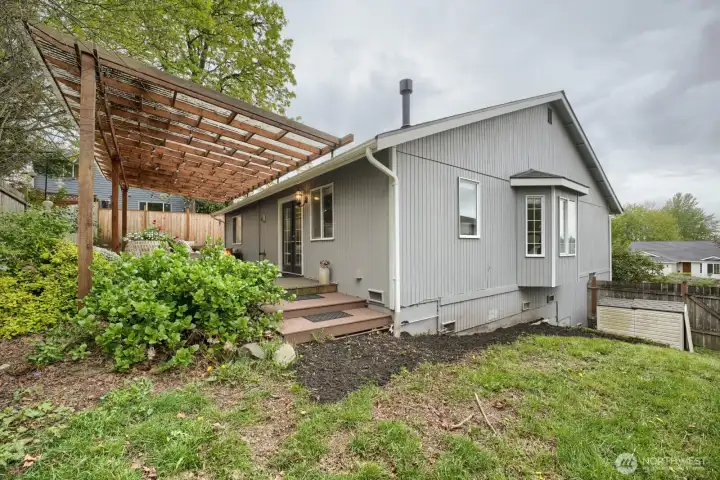 Gates at both sides of the property.  Behind this photo is a sizable gardening planter area