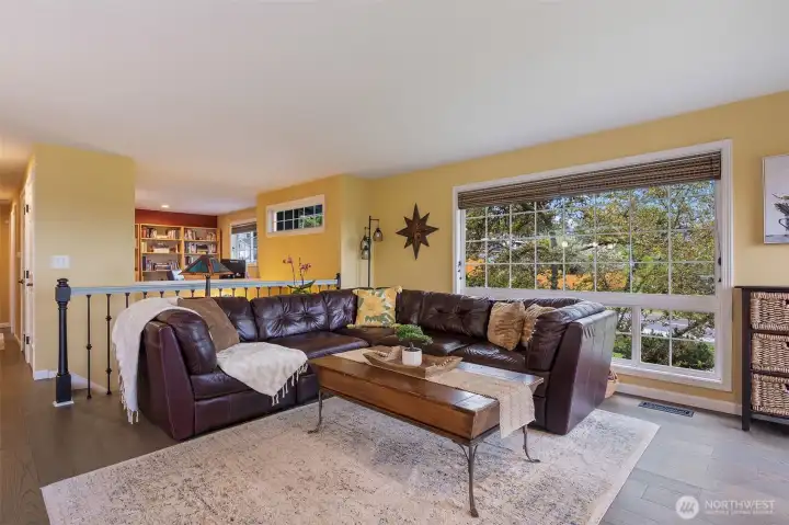 Office (behind the couch) is open to take advantage of the view