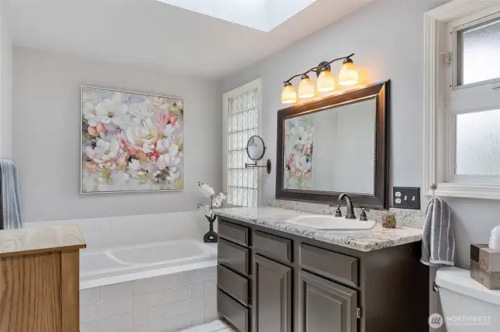 Soak away your aches and pains in the updated primary bath