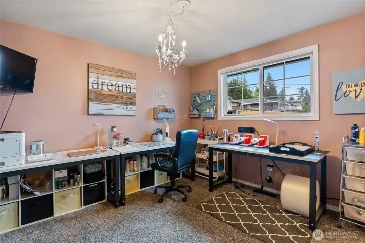 Bedroom #2 is currently used as a crafts room