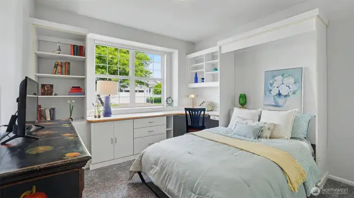 Second bedroom in it's own wing with murphy bed included. Murphy bed easily converts to a desk.
