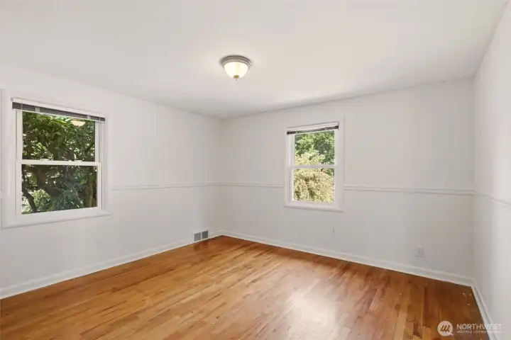 Second bedroom with hardwood floors