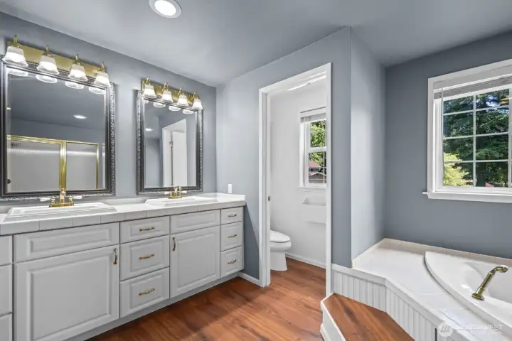 primary bathroom from primary bedroom door