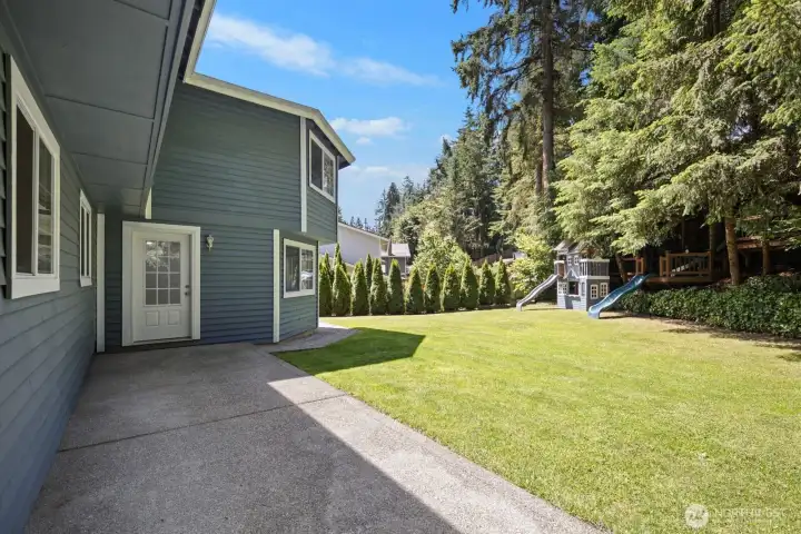 backyard looking toward den exterior door