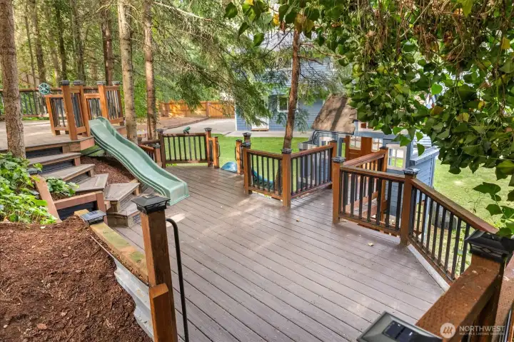 play area or deck level 1 as seen from pathway looking over backyard