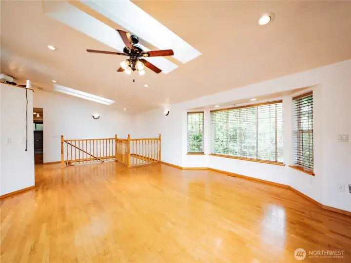 REVERSE OF THE GREAT ROOM...HARDWOOD FLOORS MAKE THE ROOM SEEM EVEN BIGGER