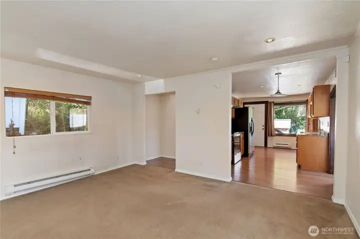 Living room looking into kitchen. Living room looking into kitchen.