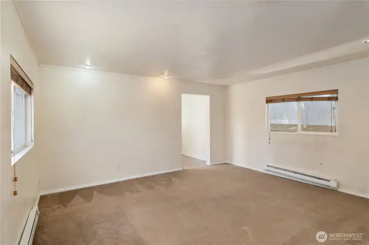 From edge of kitchen, another view of living room. From edge of kitchen, another view of living room.