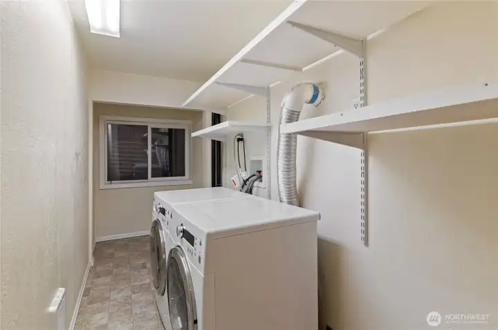 Laundry area in basement. Laundry area in basement.