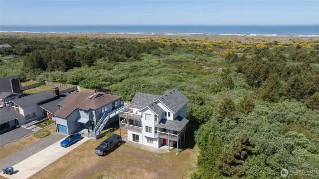 3 story home, large lot, with new roof!  View of ocean from top floor where the living and kitchen are!