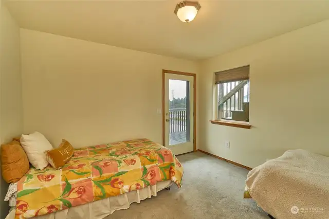 3rd bedroom fits 2 twin beds and has own door to deck. Middle level