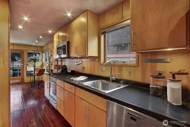 The hardwood floors are throughout the houseboat on the first floor.