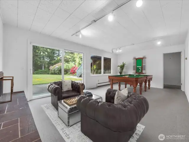 Downstairs bonus room virtually staged.