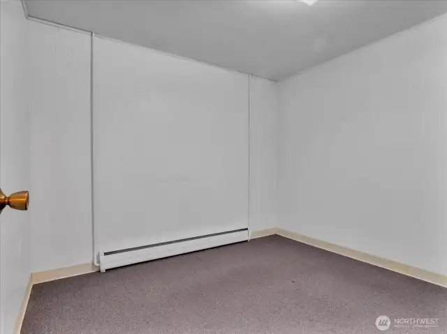 Hobby room or office in daylight basement.