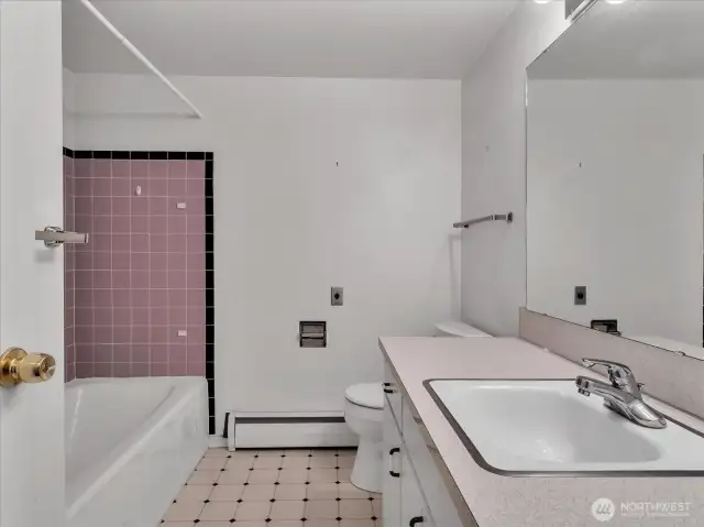 Full bath in daylight basement level.