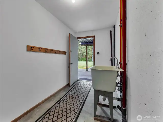 Rear entry offers possibilities of a second laundry/kitchenette space.