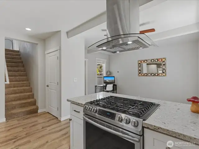 Stairs lead to primary bedroom + 2 other  large bedrooms.