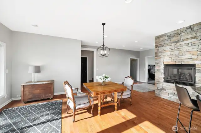 Open dining area with gas fireplace