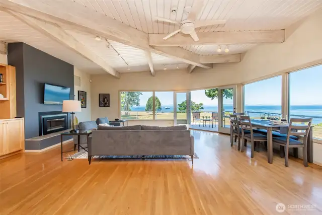 Flanked by walls of windows, this room has a ton of wonderful, indirect natural sunlight!